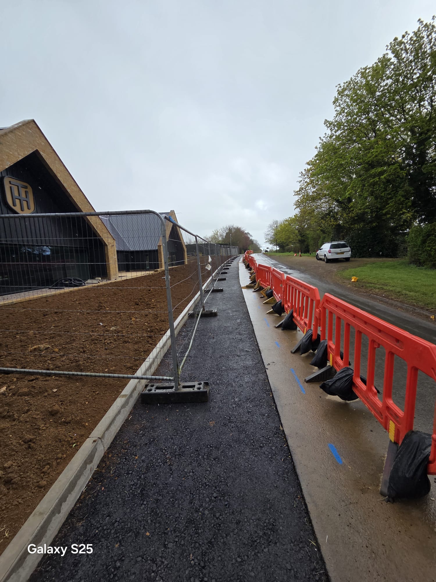 Barriered pedestrian route alongside footway construction works